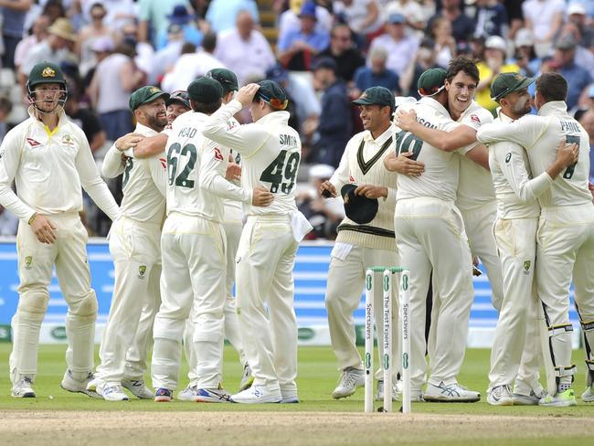 Australia players celebrate after beating England by 251 runs during day five of the first Ashes Test cricket match between England and Australia at Edgbaston in Birmingham, England, Monday Aug. 5, 2019. (AP Photo/Rui Vieira)