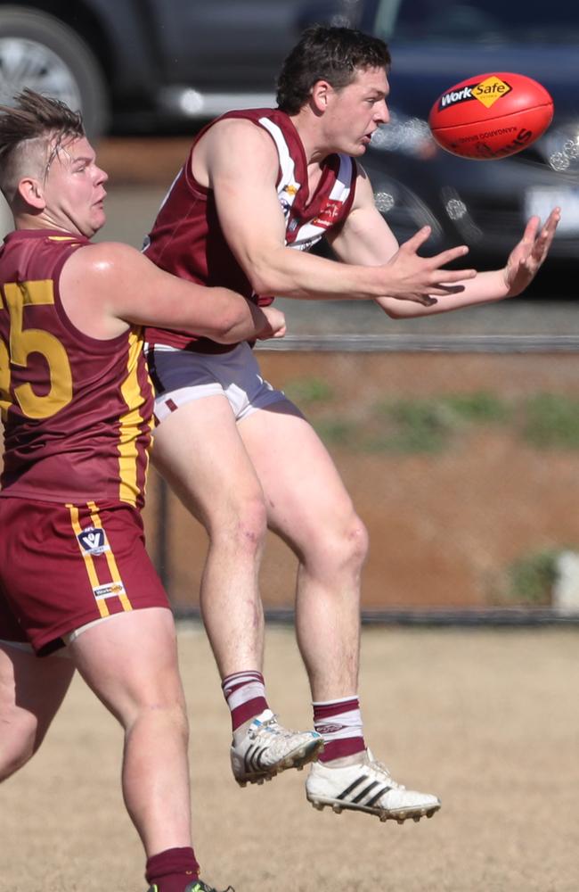 Max Kleverkamp (R) playing for Mt Evelyn. Picture: David Crosling