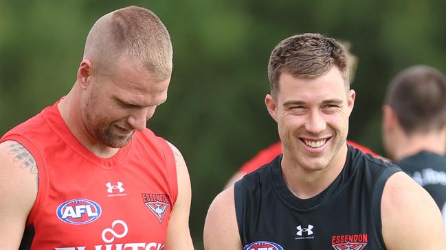 MELBOURNE, AUSTRALIA - JANUARY 30 2024 Jake Stringer and Zach Merrett at Essendon pre-season training at the Hanger.Picture: Brendan Beckett