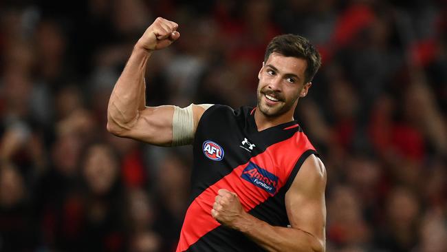 MELBOURNE, AUSTRALIA – MARCH 26: Kyle Langford of the Bombers celebrates kicking a goal during the round two AFL match between Essendon Bombers and Gold Coast Suns at Marvel Stadium, on March 26, 2023, in Melbourne, Australia. (Photo by Quinn Rooney/Getty Images)