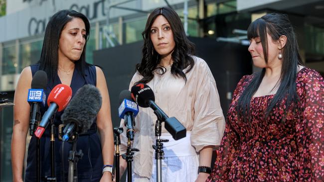 Sisters Elly Sapper, Dassi Erlich and Nicole Meyer outside Victorian County Court in Melbourne after the verdict on Monday. Picture: David Geraghty