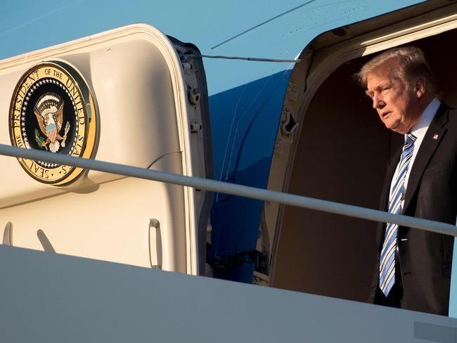 President Trump arrives at Palm Beach International Airport in West Palm Beach, Florida on the day the indictment of 13 Russians was announced. Picture: AFP