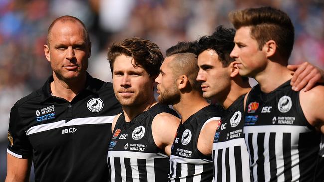 Coach Chad Cornes with Steven Summerton and the Port Adelaide Magpies at last year’s SANFL grand final. Picture: Daniel Kalisz/Getty Images