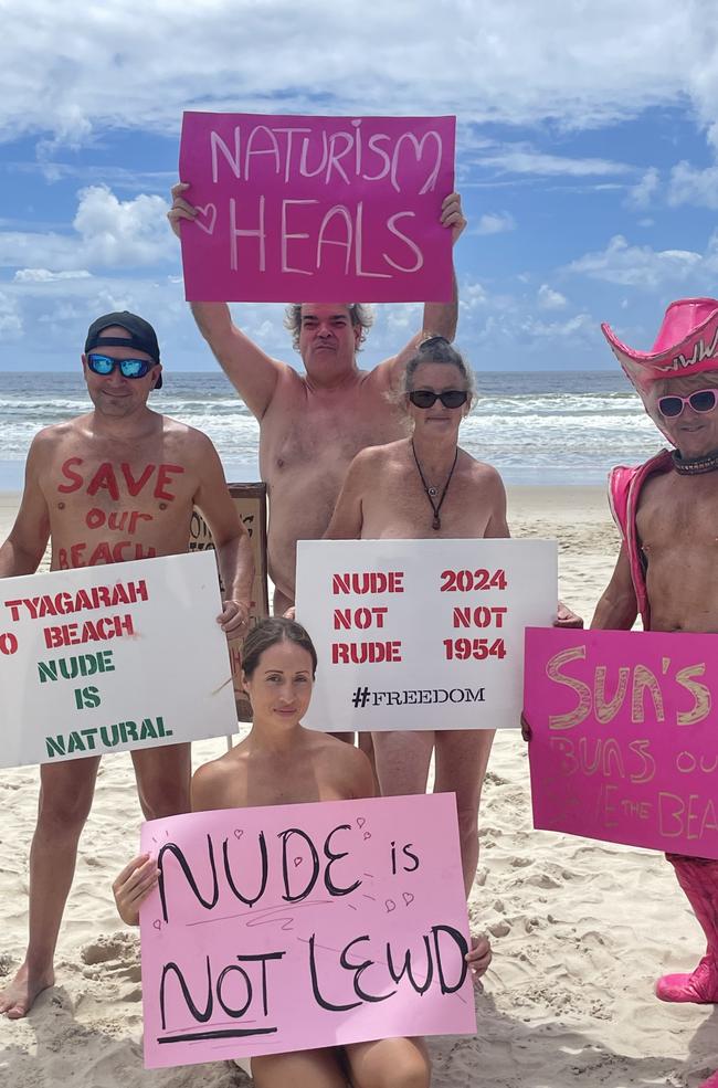 Nude blogger Jessa O’Brien (kneeling) says she has felt safe at the beach since a crackdown on anti-social behaviour in 2018. Picture: Sam Stolz