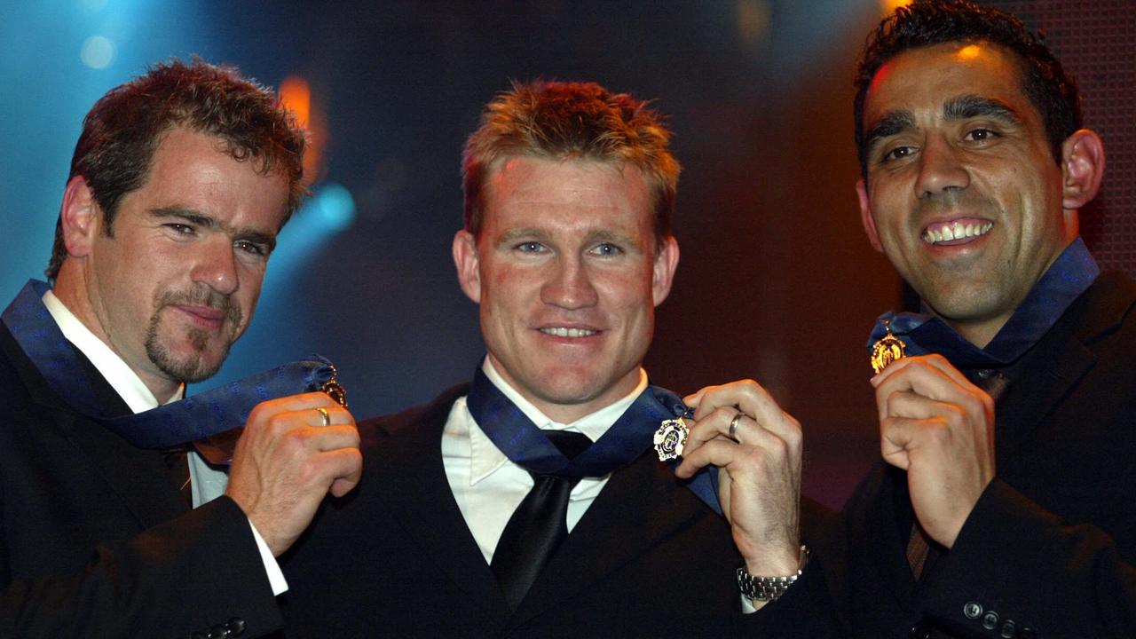 Adam Goodes, Mark Ricciuto and Nathan Buckley with their Brownlow Medals. Picture: Michael Dodge