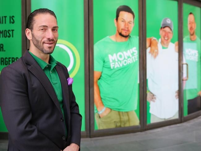 Sam Mustaca a the site of the first Wahlburgers restaurant Circular Quay. It opened in february this year. Picture: Christopher Khoury)