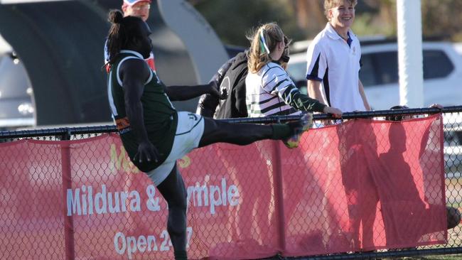 Anthony McDonald-Tipungwuti has a shot on goal. Picture: Rita Morello.