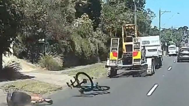 North Melbourne legend Glenn Archer apologised after the truck crash left cyclist Mark Vander injured. Picture: 9 News