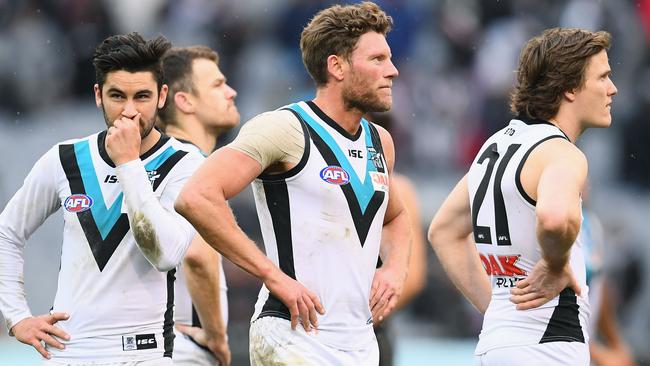 Power players look dejected after losing the round 22 match to Collingwood at the Melbourne Cricket Ground. Picture: Quinn Rooney/Getty Images