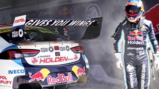 DAILY TELEGRAPH – Pictured is Craig Lowndes after coming into the pits with his Redbull Holden Commodore on fire, during the Co-Driver practice session at Mount Panorama Raceway in Bathurst today ahead of this weekends Bathurst 1000. Picture: Tim Hunter.