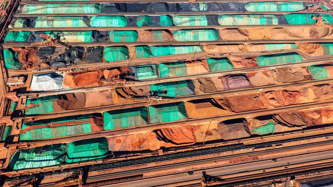 An aerial view of imported iron ore piled up at a port in Qingdao, in China's eastern Shandong province in November. Picture: AFP