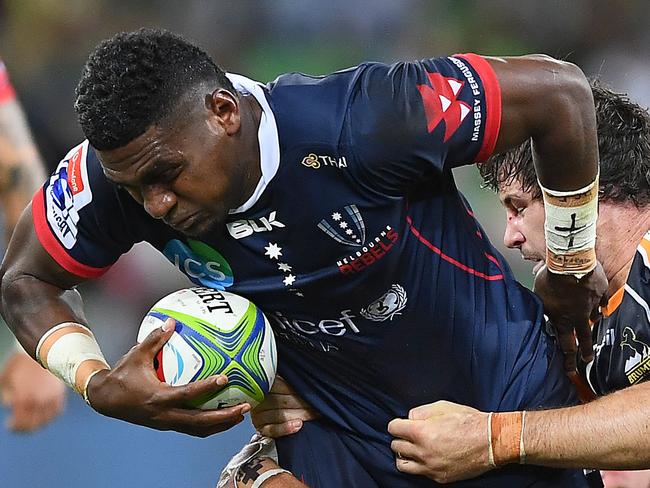 MELBOURNE, AUSTRALIA - MARCH 08: Isi Naisarani of the Rebels is tackled during the round four Super Rugby match between the Rebels and the Brumbies at AAMI Park on March 08, 2019 in Melbourne, Australia. (Photo by Quinn Rooney/Getty Images)