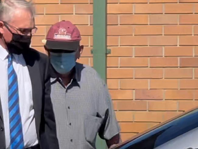 John Vincent Lewis (right) with his lawyer outside Hervey Bay District Court.