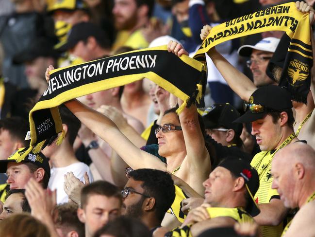 WELLINGTON, NEW ZEALAND - MARCH 15: Phoenix fans show their support during the round 23 A-League match between Wellington Phoenix and Melbourne Victory at Westpac Stadium on March 15, 2020 in Wellington, New Zealand. (Photo by Hagen Hopkins/Getty Images)