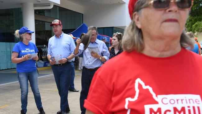 LNP leader Tim Nicholls with Ian Walker at the booths in Upper Mt Gravatt. Picture: AAP/Tracey Nearmy