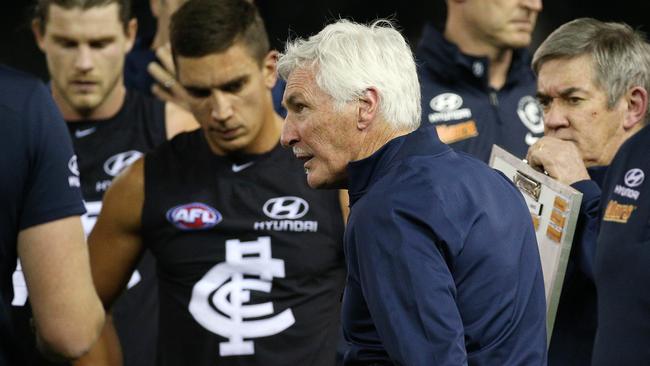 Malthouse addresses his players at quarter-time on Saturday. Picture: George Salpigtidis