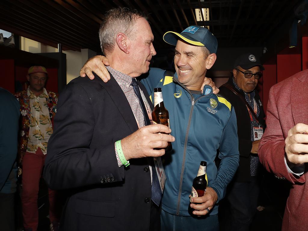 MANCHESTER, ENGLAND - SEPTEMBER 08: Australian Chairman of Selectors, Trevor Hohns, and Justin Langer, coach of Australia, celebrate in the change rooms after Australia claimed victory to retain the Ashes during day five of the 4th Specsavers Test between England and Australia at Old Trafford on September 08, 2019 in Manchester, England. (Photo by Ryan Pierse/Getty Images)