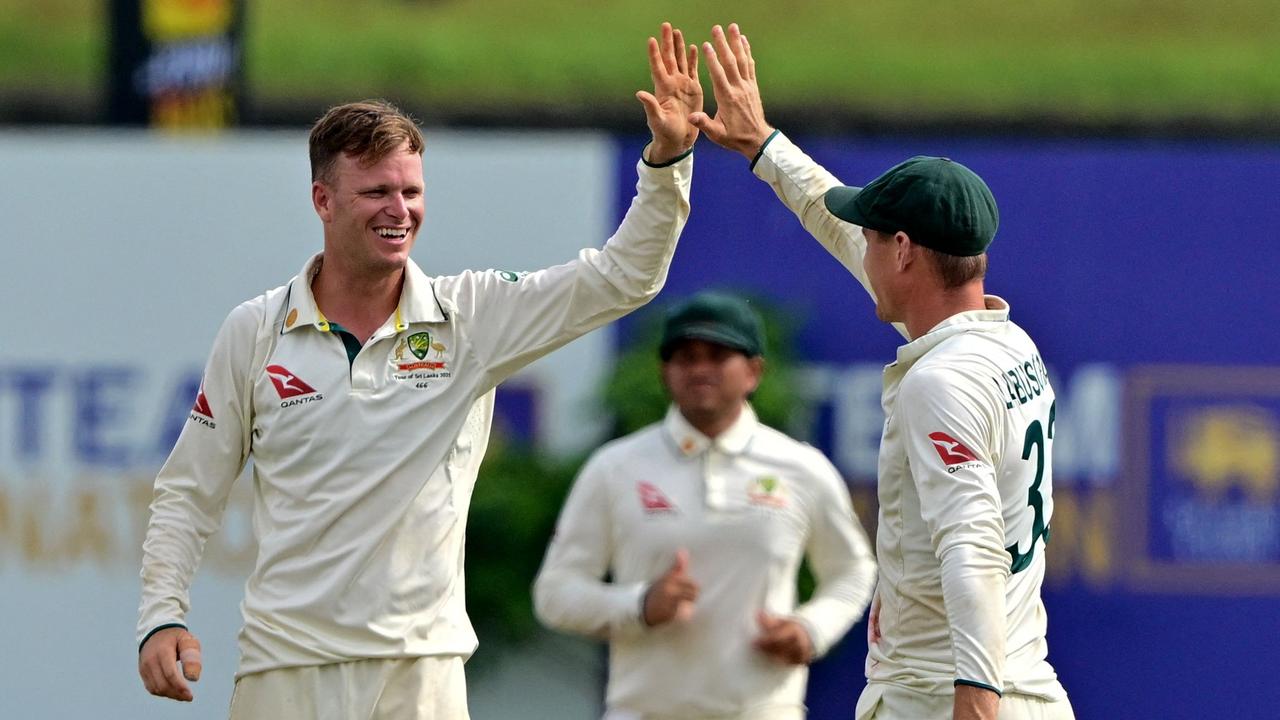 Matthew Kuhnemann (L) was the pick of the bowlers in the first Test. (Photo by Ishara S. KODIKARA / AFP)