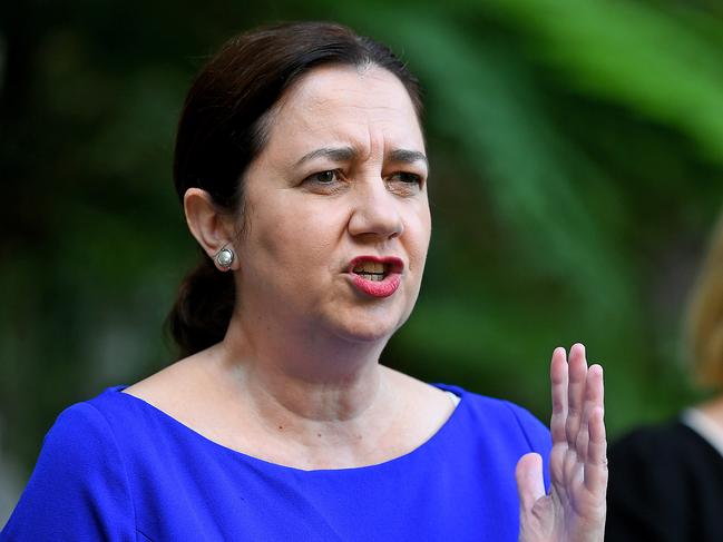 Queensland premier Annastacia PalaszczukThe Premier and CHO with Steven Miles on the lawn at Parliament talking about the Coronavirus.Friday March 20, 2020. (AAP image, John Gass)