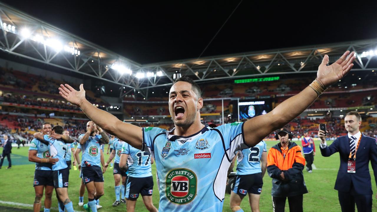 Jarryd Hayne celebrates an Origin victory during his playing days. Picture: Brett Costello