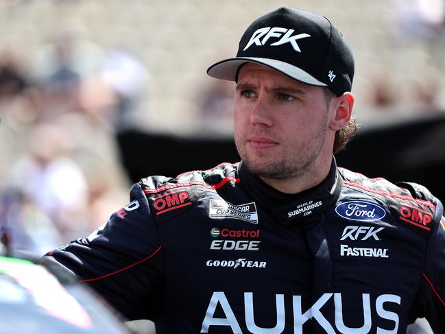 SONOMA, CALIFORNIA - JUNE 08: Cam Waters, driver of the #60 AUKUS/BuildSubmarines.com Ford, looks on during qualifying for the NASCAR Cup Series Toyota/Save Mart 350 at Sonoma Raceway on June 08, 2024 in Sonoma, California. (Photo by Meg Oliphant/Getty Images)