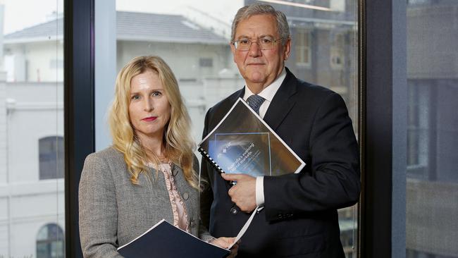 ASIC commissioner Simone Constant and chair Joe Longo with the corporate regulator’s report into Australia's Evolving Capital markets. Picture: John Appleyard