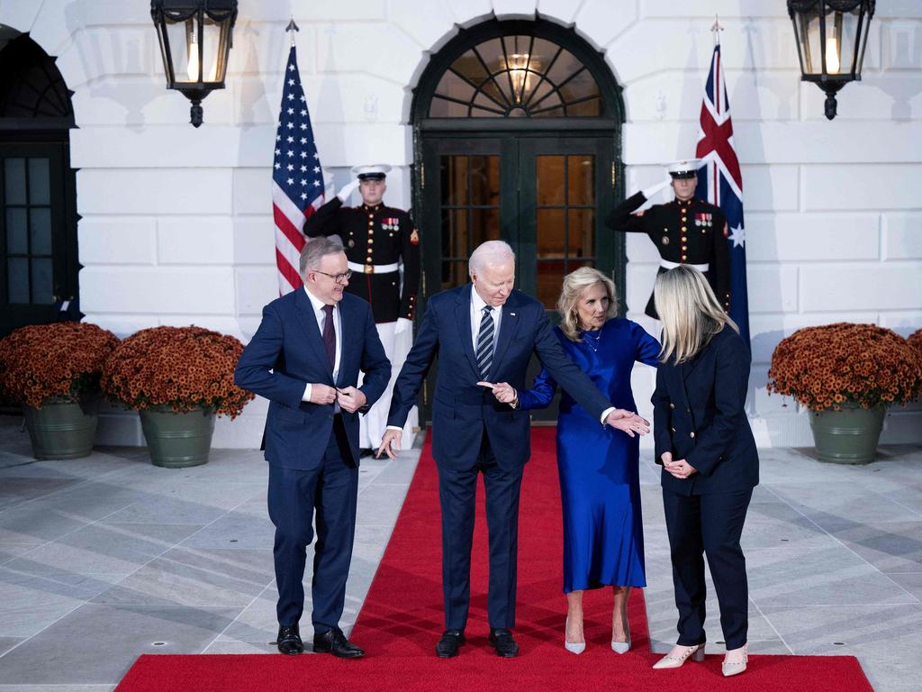 The US President and First Lady show Jodie Haydon her position as Prime Minister Anthony Albanese looks on before they pose for pictures at the South Portico of the White House. Picture: AFP