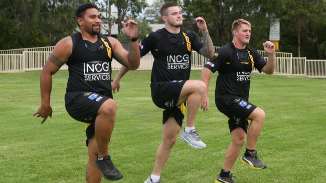 NSW Cup players Vaipuna Tia Kilifi, Dom Reardon and Magnus Stromquist wear Sports Performance Trackers while they train. Photo: Ian Svegovic