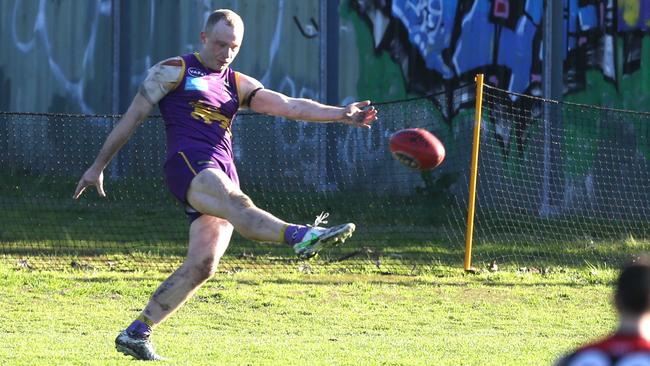 Luke McCleary kicks the ball for Collegians. Picture: Stuart Milligan