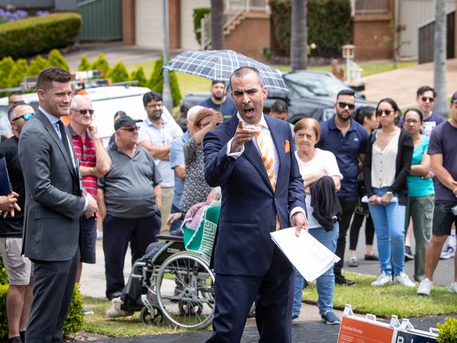 10th December 2022. The Sunday Telegraph. Property.Greystanes, Sydney, NSW, Australia.Pics by Julian Andrews.Pictures from the auction of 6, Beechwood Avenue as auctioneer Michael Garofolo brings down the gavel on the sale.