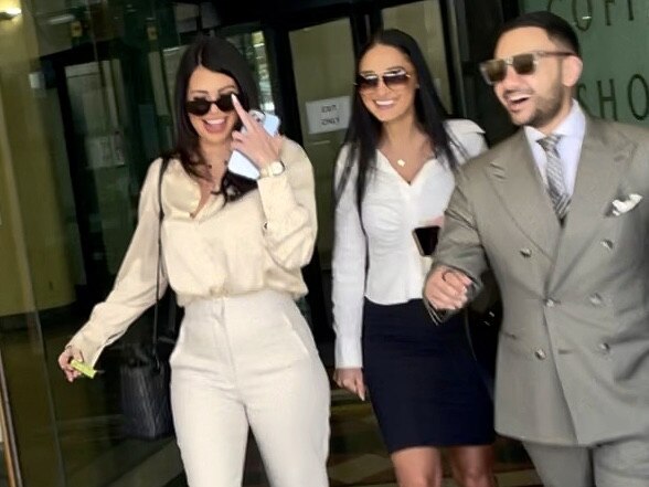 Ashley Blues (white pants) leaving Downing Centre Local Court on Nov 16 2022 after being sentenced for cocaine possession