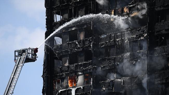 Smouldering remains of the Grenfell Tower. Picture: Carl Court/Getty Images.
