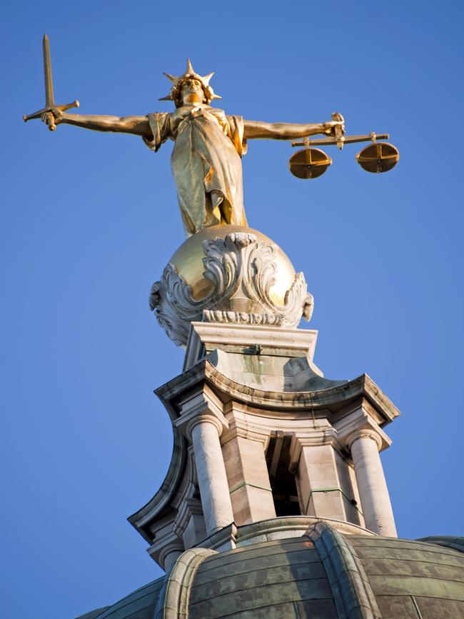 Statue of justice on the top of the Old Bailey, London's Central Criminal Court. Istock