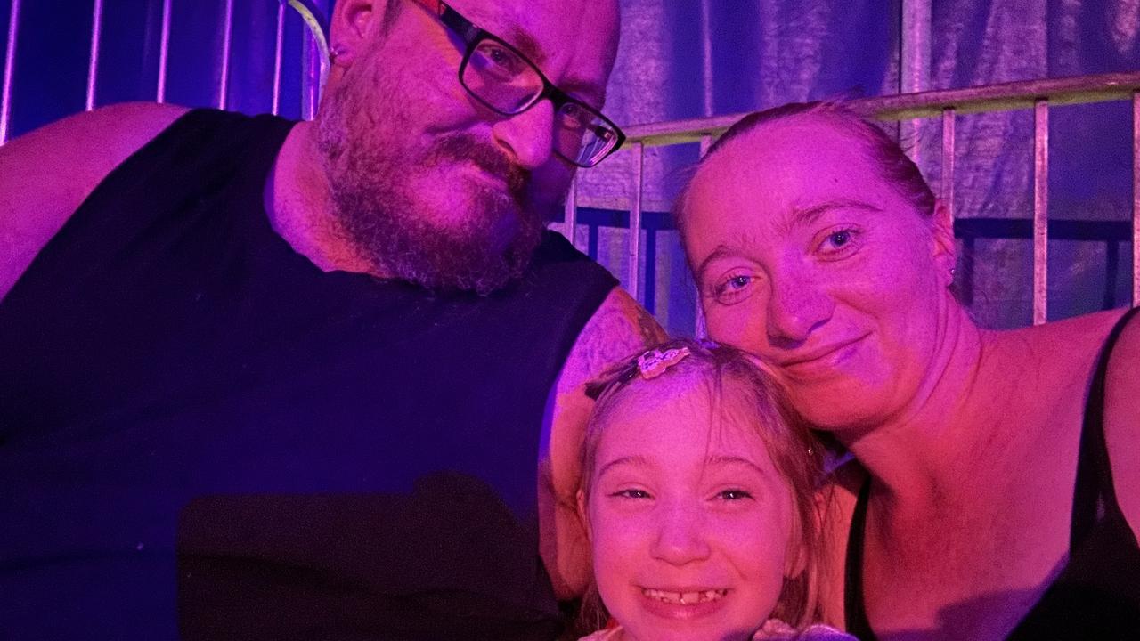 Eight-year-old Raven Contini died after a devastating fire ripped through a family home in Thorneside, south of Brisbane. Pictured with her mum, Chloe, and stepdad, Matt. Picture Supplied