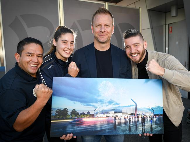 Former Socceroo Vince Grella (3R) and current local players Zak Shojaie (Afghan Victory) Natasha Dakic (southern United) and Mal Suleman (Dandenong South) with the design of the proposed Dandenong Stadium.