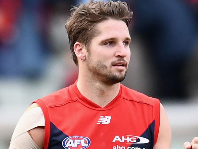MELBOURNE, AUSTRALIA - AUGUST 20:  Jesse Hogan of the Demons celebrates winning the round 22 AFL match between the Melbourne Demons and the Brisbane Lions at Melbourne Cricket Ground on August 20, 2017 in Melbourne, Australia.  (Photo by Quinn Rooney/Getty Images)