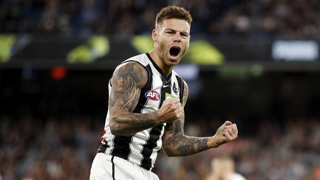 Elliott celebrates a goal during the first quarter against the Blues. Picture: Getty Images