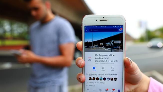 Celeste Dao hold her phone showing the Facebook event, which gained 5600 supporters within four days. Picture: AAP IMAGE/ Angelo Velardo