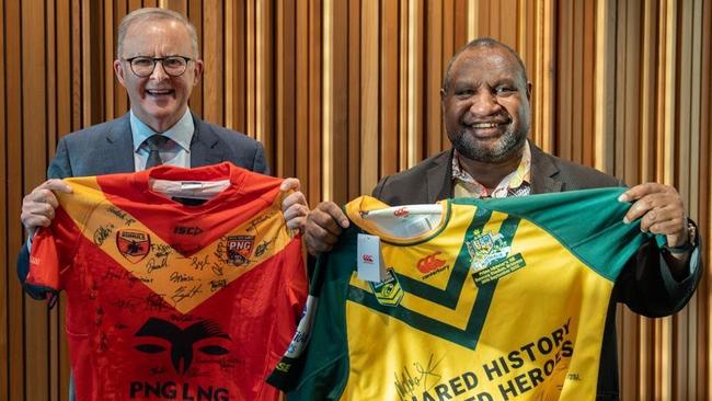 Anthony Albanese and James Marape exchange jerseys ahead a match in Brisbane in September 2022. Picture: PMO