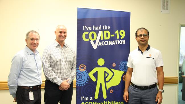 Central Queensland Hospital and Health Service Chief Executive Steve Williamson, Regional Development, Manufacturing and Water Minister, Member for Gladstone Glenn Butcher and Gladstone and Banana Shire Director of Medical Services Dr Dilip Kumar at Gladstone Hospital's West Wing after Dr Kumar received the first AstraZeneca COVID vaccination in Gladstone. Picture: Rodney Stevens