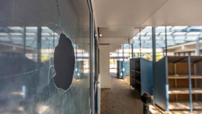 Damage to Happy Valley Primary School windows, which were smashed with hundreds of golf balls. Picture: Ben Clark