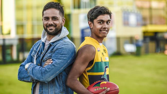 Port Adelaide premiership player Peter Burgoyne with his son, Trent, who has joined the Power via Friday’s rookie draft. Picture: AAP/Roy Vandervegt