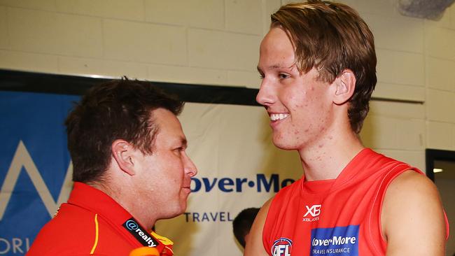 Suns head coach Stuart Dew celebrates the win with Jack Lukosius after Gold Coast defeated Western Bulldogs in round 3. Picture: Michael Dodge/Getty Images