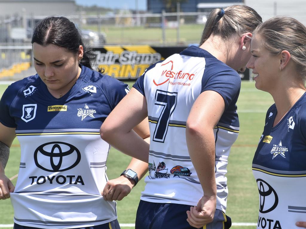 Zoe Martin (left), Kortney Deguara and Alicia Martin in the new North Queensland Gold Stars jerseys at BB Print Stadium ahead of the QRLW season. Picture: Matthew Forrest