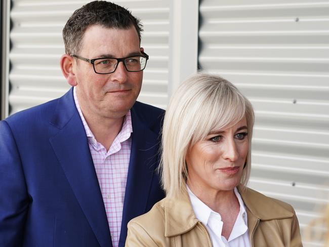 Victorian Premier Daniel Andrews (left) is seen with his wife Catherine Andrews (centre) during a press conference in Melbourne, Wednesday, October 24, 2018. The premier has announced that Victoria will hold a royal commission into mental health if Labor is re-elected next month. (AAP Image/Alex Murray) NO ARCHIVING