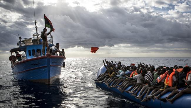 The World Press Photo Foundation announces the winners of its renowned contests, the 60th annual World Press Photo Contest and the 7th annual World Press Photo Digital Storytelling Contest. Spot News - Third Prize, StoriesPicture: Mathieu Willcocks Title: Mediterranean Migration Libyan fishermen throw a lifejacket at a rubber boat full of migrants . Migrants are very often not given any life jackets or means of communication by their smugglers. More often than not they only have some water, food and not enough fuel to make it to Italy.The central Mediterranean migration route, between the coasts of Libya and Italy, remains busy. According to reports by the UNHCR, 5,000 people died while attempting to cross the Mediterranean in 2016. NGOs and charities such as Migrant Offshore Aid Station (MOAS) continue their efforts to patrol the patch of sea north of the Libyan coast, in the hope of rescuing refugees before the potential of drowning. The rescue team on board the MOAS’ Responder are there to mitigate loss of life at sea. Operating like a sea-born ambulance, they rush to assist and rescue refugee vessels in distress, provide medical assistance, and bring the refugees safely to Italy2016 was a deadly year of migrants and refugees trying to cross the mediterranean from Libya's coasts to Italy's. With ever increasing numbers of unseaworthy boats attempting the crossing, charities and NGOs like MOAS are often overwhelmed. MOAS, together with medical teams from the red cross, operates two rescue vessels, the Responder and the Phoenix, just off the coast of Libya. They sit in international waters and await either the distress call from migrants lucky enough to have been given a satellite phone by their smuggler, or to visually find migrants boats - often in the dead of night. Then the race to rescue them before it too late starts. © Mathieu Willcocks/MOAS.eu 2016, all rights reserved.