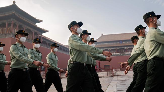 On the march: China is increasingly asserting itself. Picture: Nicolas Asfouri / AFP