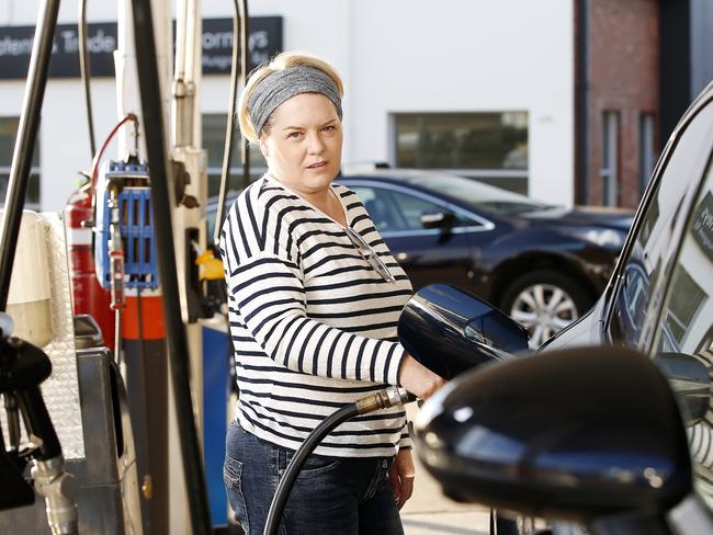 Vanessa Cribb fills up at Freedom Fuels in Brisbane’s Red Hill this week. Picture: Josh Woning