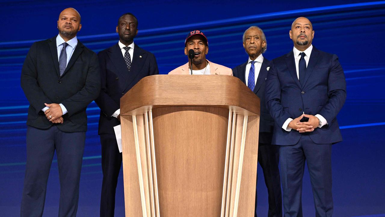 US civil rights activist Rev. Al Sharpton (2nd R) was joined onstage by members of the "Central Park Five," at the Democratic National Convention in Chicago last month. (Photo by SAUL LOEB / AFP)