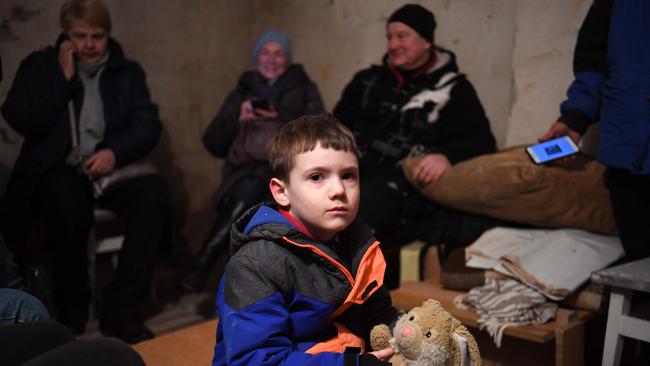 Mikhailo, 5, takes refuge in an underground shelter during a bombing alert in the Ukrainian capital of Kyiv. Picture: AFP